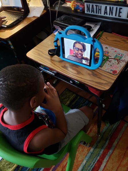 Nathaniel, kindergarten at Patrick Henry K-8 School. His teacher, Ms. Mills, held class for parents to ask questions, then read to the students and asked them questions. “I love that his teacher set up time for an afternoon class. This made his day,” said parent Sabrina Settles McGill. 