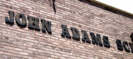 John Adams name on side of school