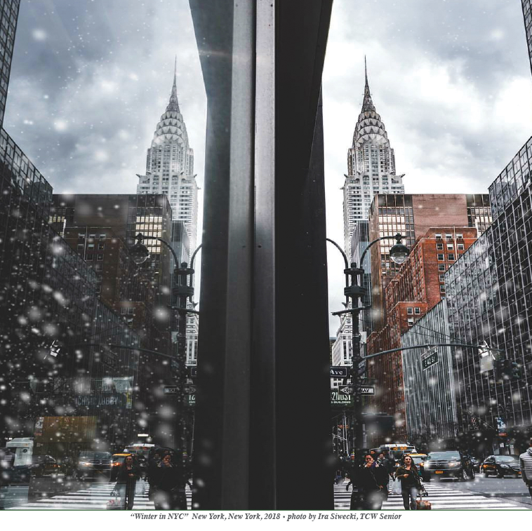 mirror image of Chrysler Building reflected in store window on a rainy day