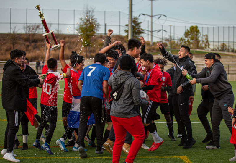 Athletico celebrates with their trophy after winning the league championship