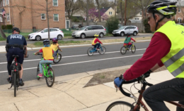 kids riding bikes into bike path from school yard