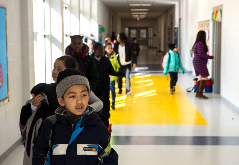 children walking through hallway at Patrick Henry
