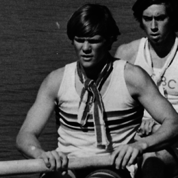 Old black and white photo of Bob Stumpf rowing