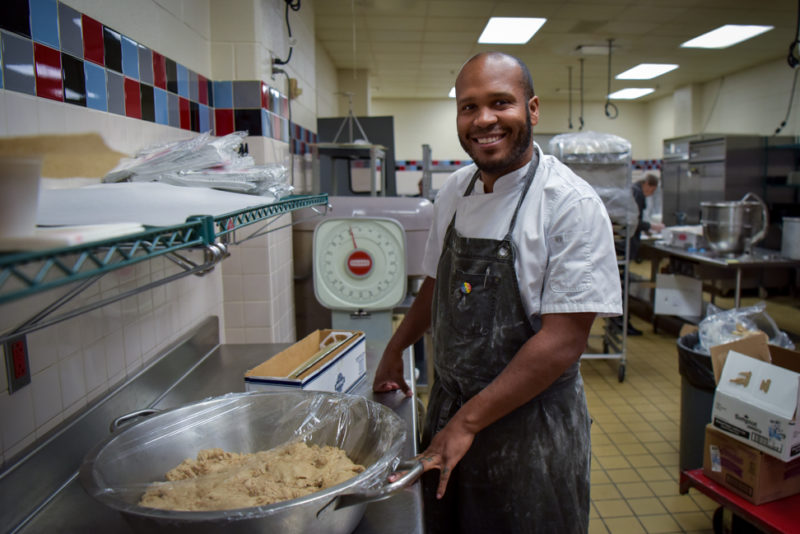 Chef Isaiah Ruffin in TC's kitchen with his homemade pizza dough