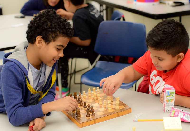 Students at Brent Place play a game of chess