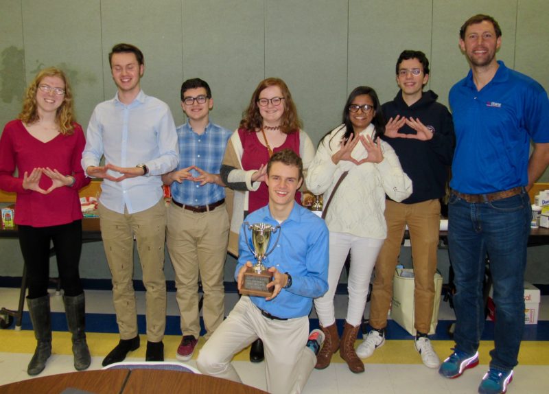 T.C.'s Scholastic Bowl Team: Kelly Jones, Jonah Horowitz, Zeke Farkas, Meredith Lemke, Mark Bailey (kneeling), Isheka Agarwal, Stefanos Psaltis-Ivanis, Matt Zahn (coach)