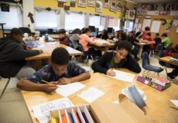 students at desk in classroom