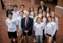 Mick Heller with journalism staff and students