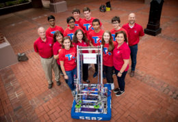 Christina Lytle, Jim Sample, Lou Fisher, Alexandra Silberglied with T.C. Williams' Titan Robotics club members