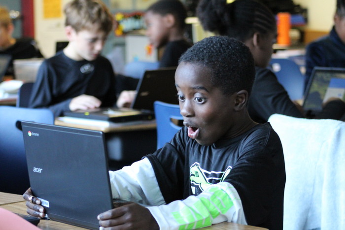 Student with Chromebook