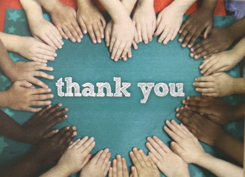 The words "thank you" surrounding by diverse hands in the shape of a heart