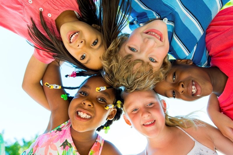 Children's heads in a circle