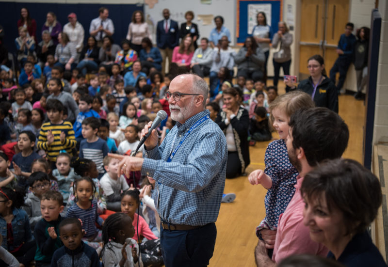 Rene Paschal reacts at being named principal of the year by the superintendent