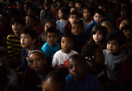 group of multi-cultural children with expressions of amazement