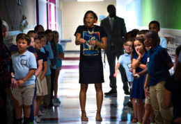 Teacher instructs children on proper behavior first day of school