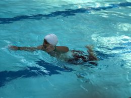 student learning swim skills