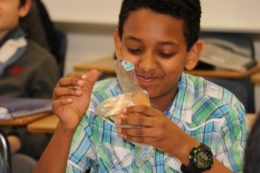 Student eating cheese stick