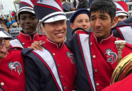 members of TC Williams react with tears and smiles to earning a SUPERIOR rating in the 2019 VBODA State Marching Assessment