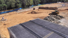 A dirt construction site where a school is about to be built