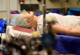 medical dummy on gurney