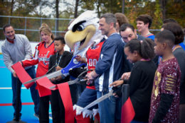 Slapshot and community cut the ribbon at hockey rink