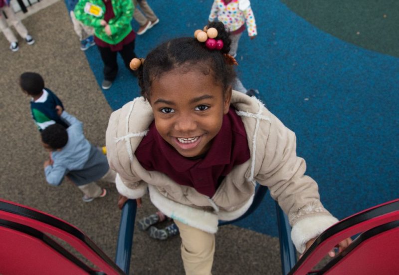 kindergartener on playground at Jefferson-Houston