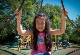 Closeup of female elementary student on playground