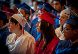 summer graduation 2018. students seated in caps and gowns