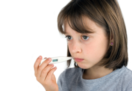 girl with thermometer in mouth