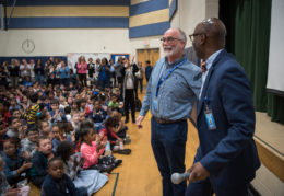 Rene Paschal reacts at being named principal of the year by the superintendent