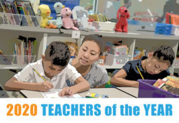 Teacher looking over shoulder of students, text says 2020 Teachers of the Year