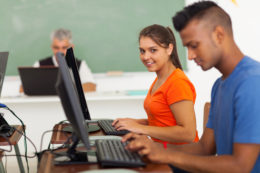 high school teenage girl in computer class