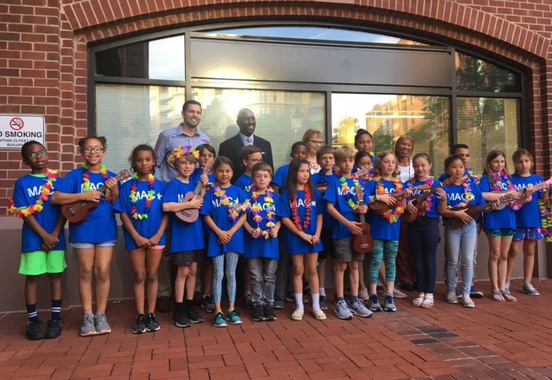 students with ukuleles before the