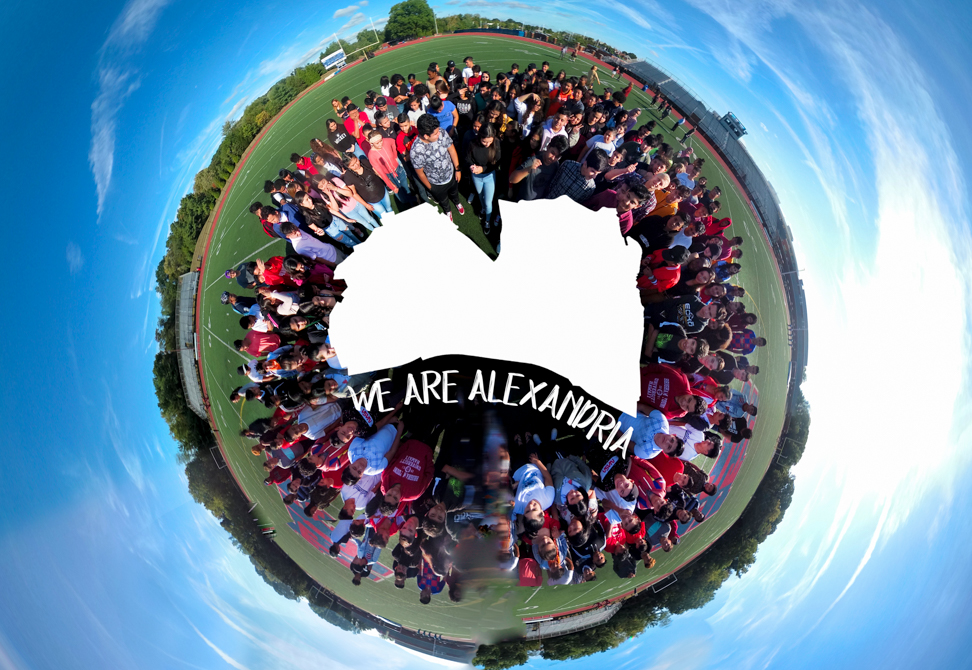 students on globe with "We Are Alexandria"