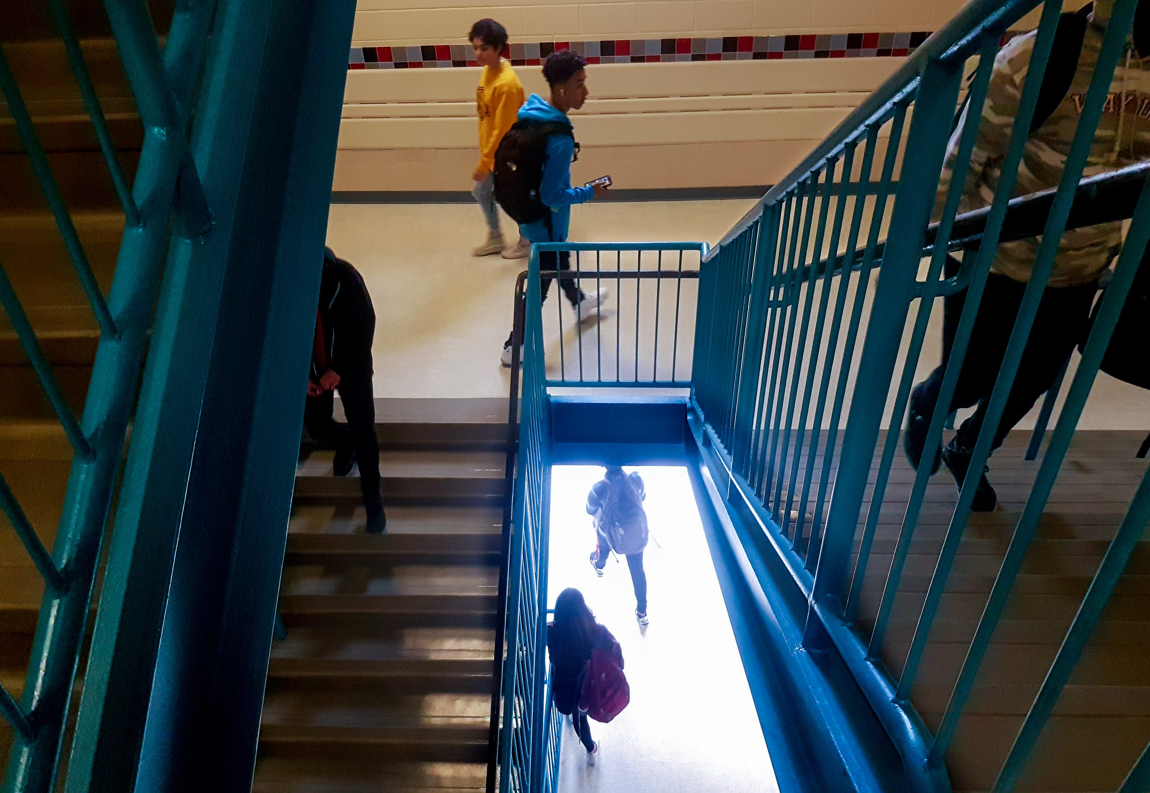 TC Williams stairwell with students