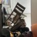 In a classroom, chairs are stacked upon each other to form a barricade in front of a window with drawn blinds during a summer ALICE (Alert, Lockdown, Inform, Counter, Evacuate) drill.